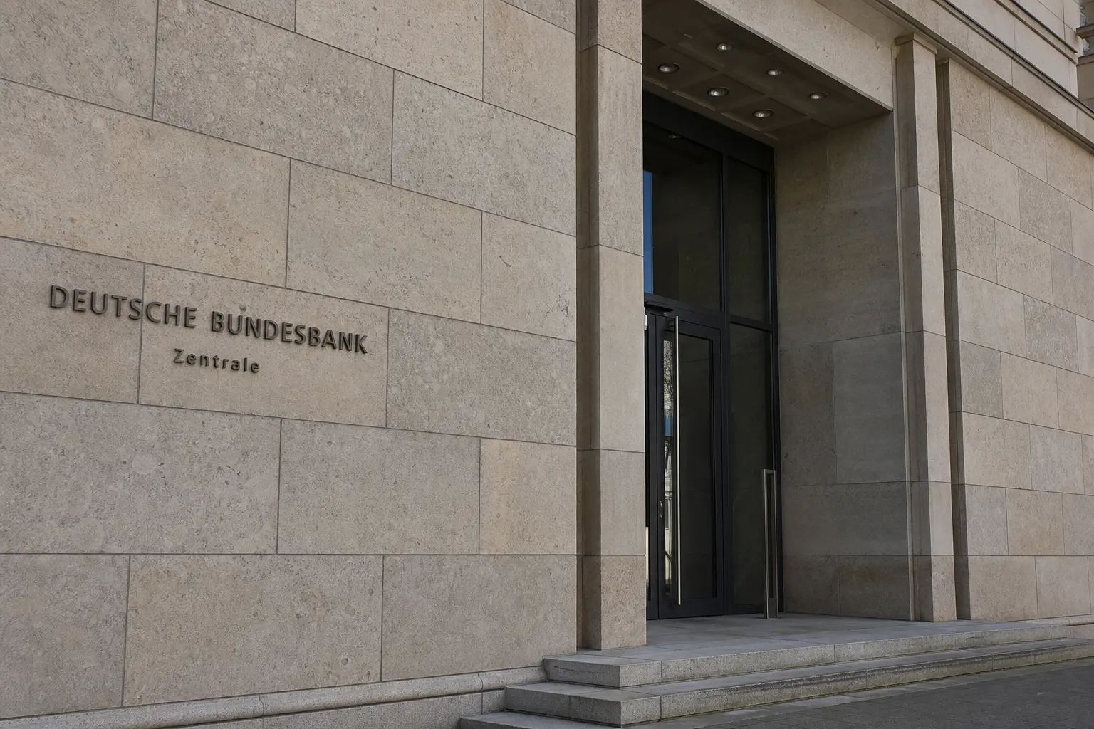 The stone facade and entrance of the Bundesbank headquarters building in Frankfurt seen in plain daylight.. apporved