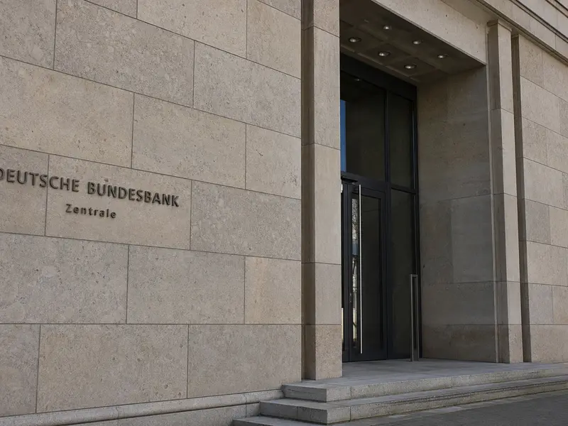 The stone facade and entrance of the Bundesbank headquarters building in Frankfurt seen in plain daylight.. apporved